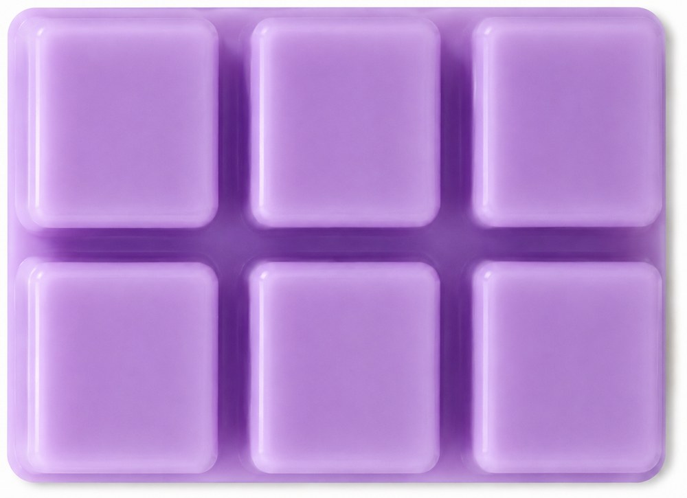 A pack of six soy wax melt cubes, scored so they break apart.